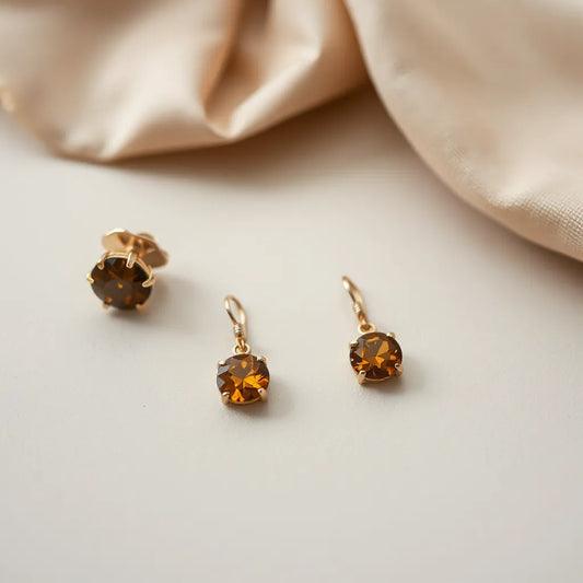 Pair of elegant gemstone earrings with faceted stones in a minimalist, well-lit jewelry setting