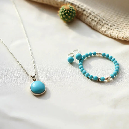 Turquoise pendant necklace with beaded bracelet and earrings styled in bohemian southwestern tones